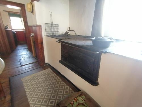 a kitchen with a counter with a pot on it at Albert Manor guest house in Ladismith