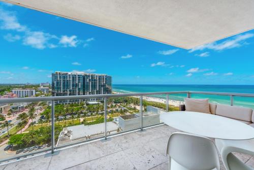 a balcony with a view of the ocean at 4B Super Premium Private Condo at the Setai in Miami Beach