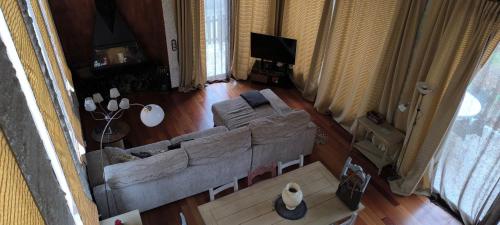 an overhead view of a living room with a couch at Cal Fraguerau in Ulldemolins