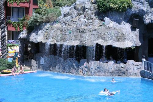 a water slide at a theme park with a waterfall at Grand Aquarium in Marmaris