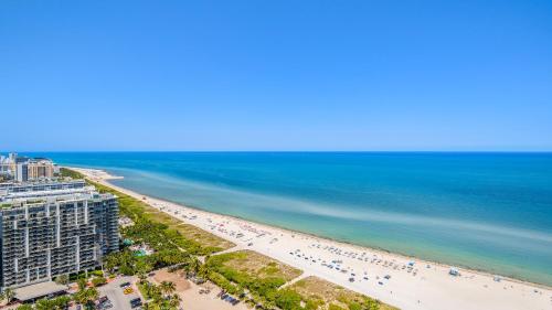 an aerial view of a beach and the ocean at Oceanview Private Penthouse Condo at The Setai -3903 in Miami Beach