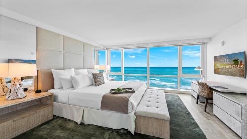 a bedroom with a bed and a view of the ocean at Oceanview Private Condo at 1 Hotel & Homes -1120 in Miami Beach