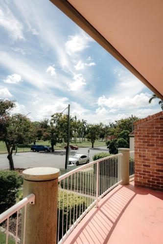 a balcony with a view of a street at Unit 2, Rocky CBD in Rockhampton