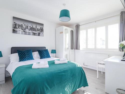 Voodi või voodid majutusasutuse Palm View toas