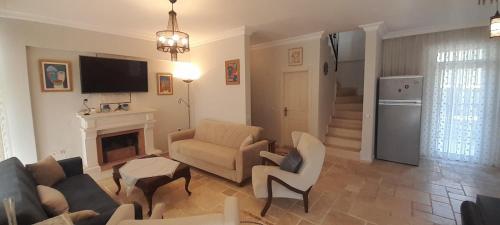 Χώρος καθιστικού στο Villa Palm Tree