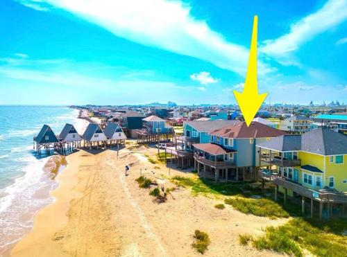 an aerial view of a beach with a yellow star on it at Starfish Beachfront Swim-Up in Surfside Beach