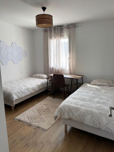 Postel nebo postele na pokoji v ubytování Maison 4 chambres près d Angers et à 500 m de la Loire