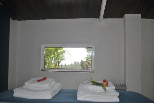 En eller flere senger på et rom på Quinta de Sao Filipe