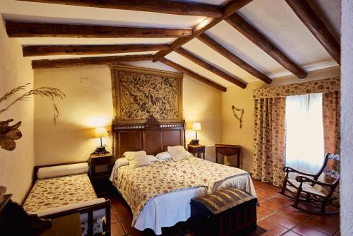 Postel nebo postele na pokoji v ubytování Casa Rural Sierra de Mampar