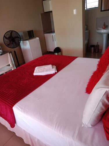 Postel nebo postele na pokoji v ubytování Rasesa Guesthouse
