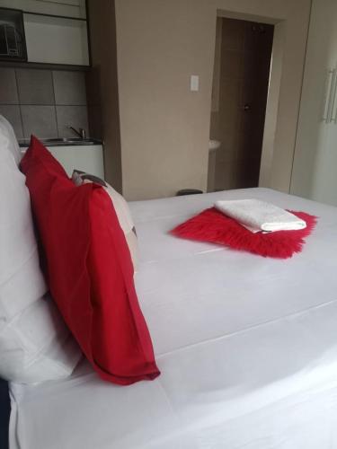 Postel nebo postele na pokoji v ubytování Rasesa Guesthouse