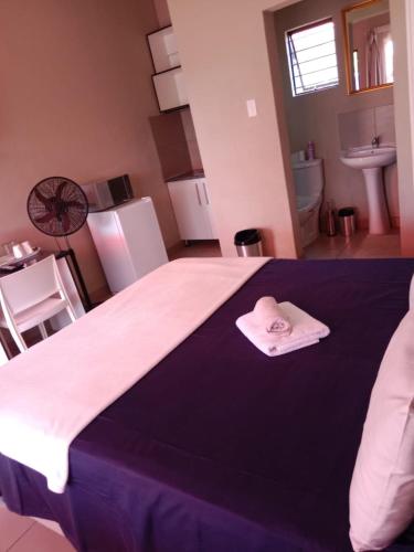 Postel nebo postele na pokoji v ubytování Rasesa Guesthouse