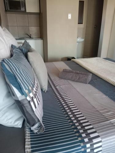 Postel nebo postele na pokoji v ubytování Rasesa Guesthouse