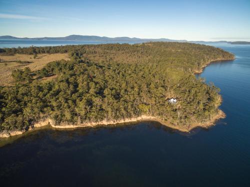 an island in the middle of a body of water at The BoatHouse in Dover