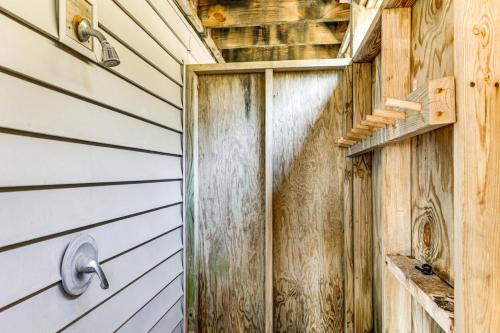 an open door of a wooden house at Steps to Beach Emerald Isle Home with Deck! in Emerald Isle