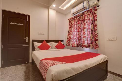 Ένα ή περισσότερα κρεβάτια σε δωμάτιο στο Hotel O Blue Moon