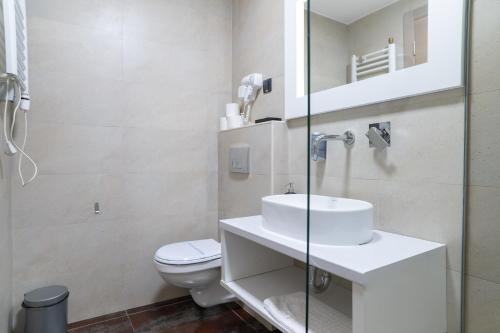 Salle de bains dans l'établissement Hotel Passport