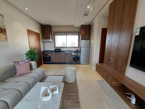 Η κουζίνα ή μικρή κουζίνα στο Appartement golfe prestigia marrakech