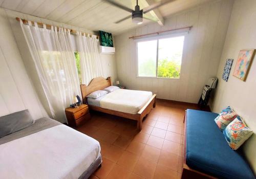 Postel nebo postele na pokoji v ubytování Kasa Leilani - the perfect getaway!