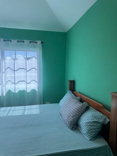 Una cama o camas en una habitación de Bayview Villa