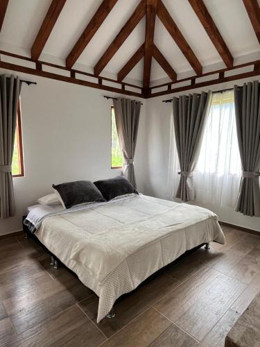Postel nebo postele na pokoji v ubytování Casa Silvestre