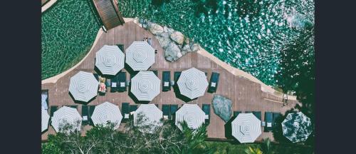 an aerial view of a building next to the ocean at Private Hotel Studio Apartment - Full Kitchen in Port Douglas
