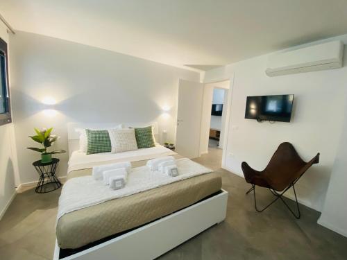 Ένα ή περισσότερα κρεβάτια σε δωμάτιο στο Elisa Apartments A - in front of the walls of Lucca