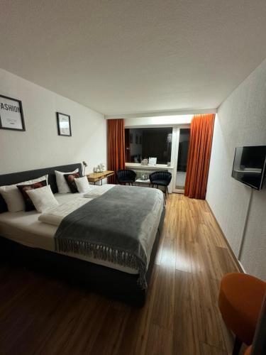 Voodi või voodid majutusasutuse Hotel Schwanenweiher Bad Bertrich toas