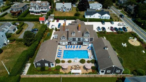 an aerial view of a house with a swimming pool at Beach Breeze Inn in Falmouth