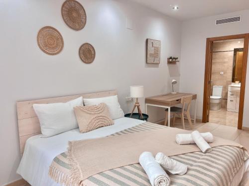 Ένα ή περισσότερα κρεβάτια σε δωμάτιο στο Apartamento Mare Nostrum