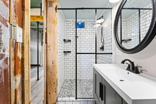 a bathroom with a shower and a sink at Nancy Key in Terrell