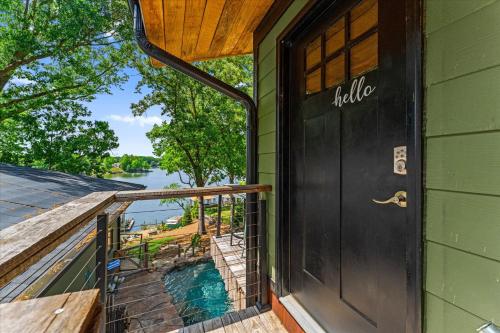 a door on the side of a house with a balcony at Nancy Key in Terrell