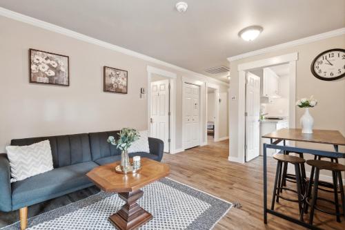 a living room with a couch and a table at Judkins Entire Upper Floor - Close to Downtown in Seattle