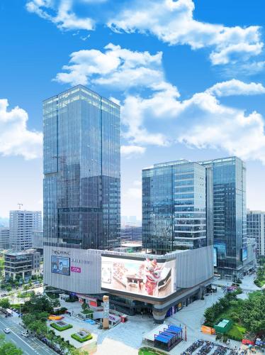 a view of a city with tall buildings at Wyndham Hotel Guangzhou Huangbian Metro Branch - Free shuttle bus to Canton Fair in Guangzhou