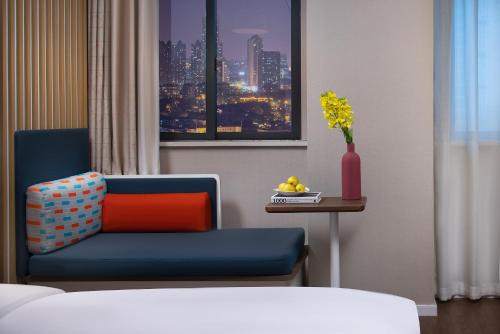 Postel nebo postele na pokoji v ubytování Holiday Inn Express Changsha South Railway Station by IHG