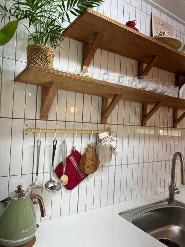 Η κουζίνα ή μικρή κουζίνα στο Fun Guesthouse Adjacent to Seongsan Ilchulbong