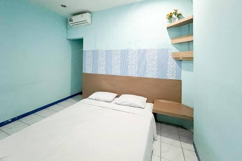 Katil atau katil-katil dalam bilik di Pondok Karisma Syariah Tasikmalaya Mitra RedDoorz