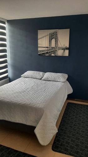Katil atau katil-katil dalam bilik di Apartamento amoblado