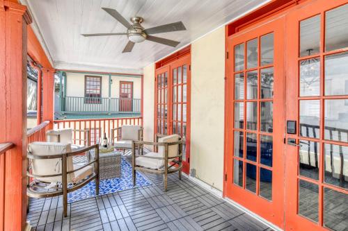 a screened in porch with a ceiling fan at 20 Hypolita Street in St. Augustine