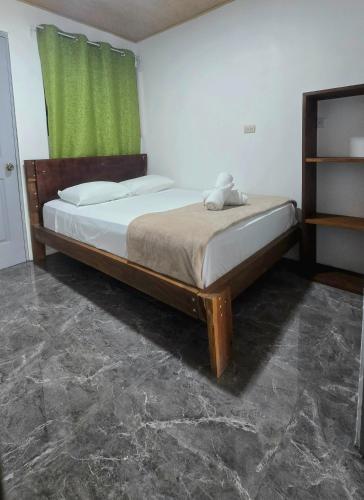 Ein Bett oder Betten in einem Zimmer der Unterkunft Hostel Cattleya - Monteverde, Costa Rica