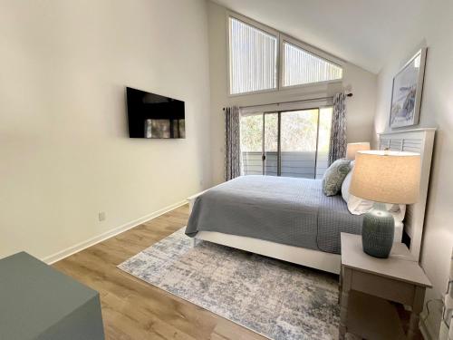 a bedroom with a bed and a window at 2975 Deer Point Dr in Johns Island