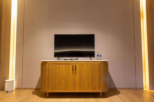 TV a/nebo společenská místnost v ubytování Gassan Khuntan Golf & Resort
