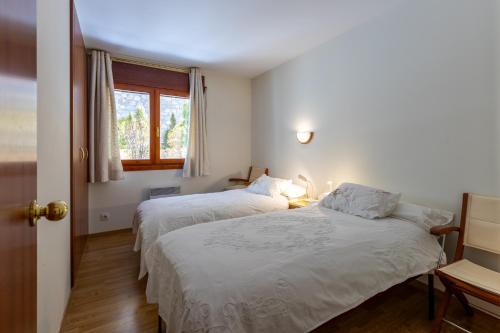 Katil atau katil-katil dalam bilik di Andorra Stunning Views Apartment - Happy Rentals
