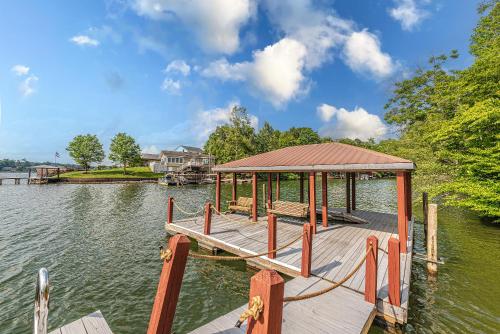 a wooden dock with a gazebo on a lake at Lake Hickory Trio 2BR Green Unit in Hickory