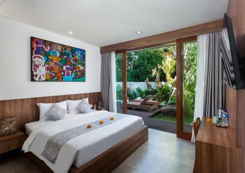 Ένα ή περισσότερα κρεβάτια σε δωμάτιο στο Villa Langon Ubud