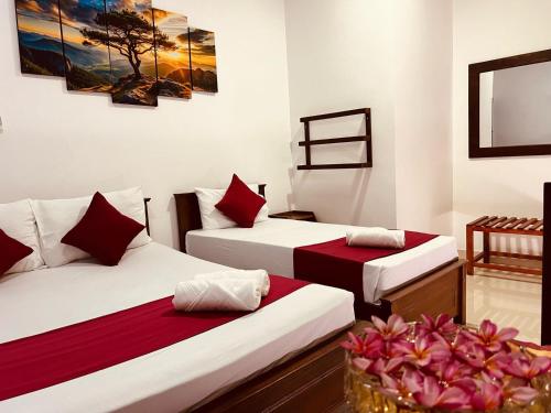 Postel nebo postele na pokoji v ubytování The Kandy Havens