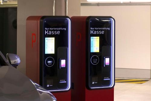 two cell phones are standing next to each other at Scandic Hamburg Emporio in Hamburg