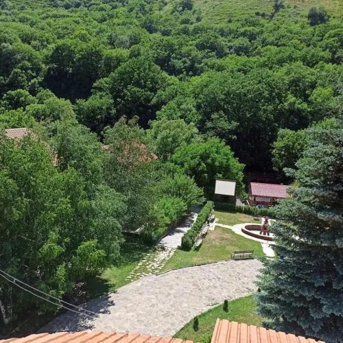 an overhead view of a park with a bench and trees at Golden Gate Resort in Agveran