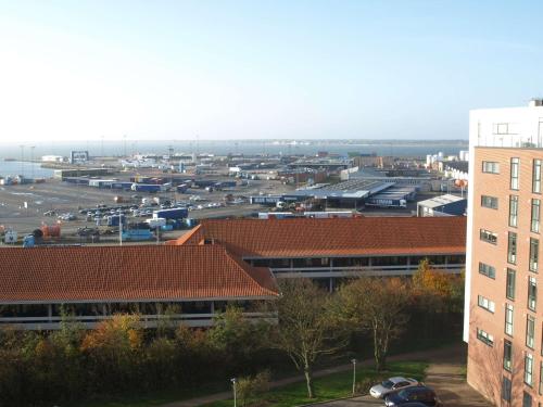 a view of a city with buildings and a parking lot at Scandic Olympic in Esbjerg