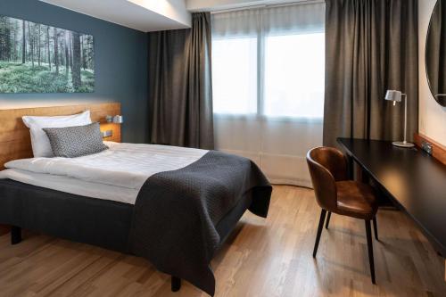 Postel nebo postele na pokoji v ubytování Scandic Espoo